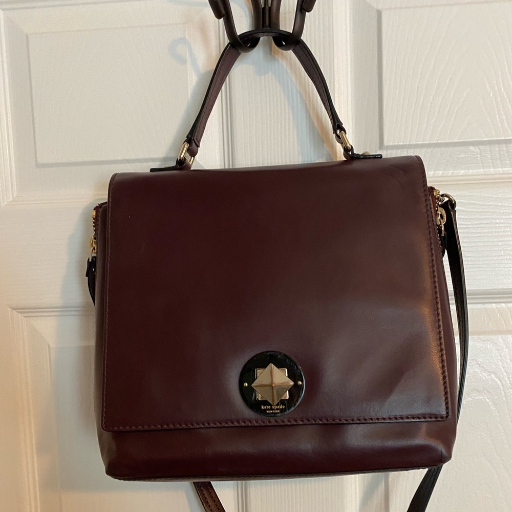 Dark burgundy Kate Spade messenger style purse